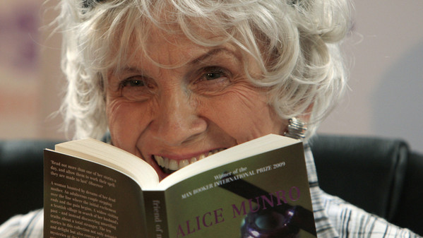 Canadian author Alice Munro holds one of
